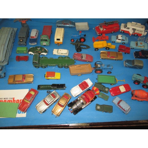 228 - A large quantity of vintage die-cast model vehicles, to include the gold and silver versions of Jame... 