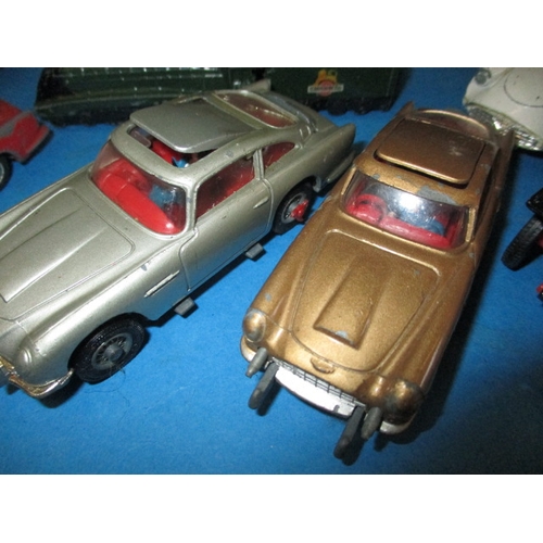 228 - A large quantity of vintage die-cast model vehicles, to include the gold and silver versions of Jame... 