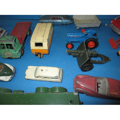 228 - A large quantity of vintage die-cast model vehicles, to include the gold and silver versions of Jame... 