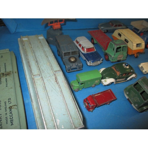 228 - A large quantity of vintage die-cast model vehicles, to include the gold and silver versions of Jame... 