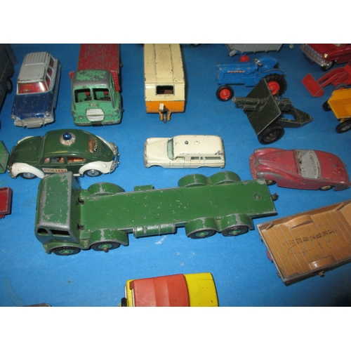 228 - A large quantity of vintage die-cast model vehicles, to include the gold and silver versions of Jame... 