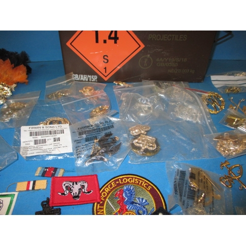 238 - A quantity of military stay-bright badges and other military insignia, all in pre-owned condition