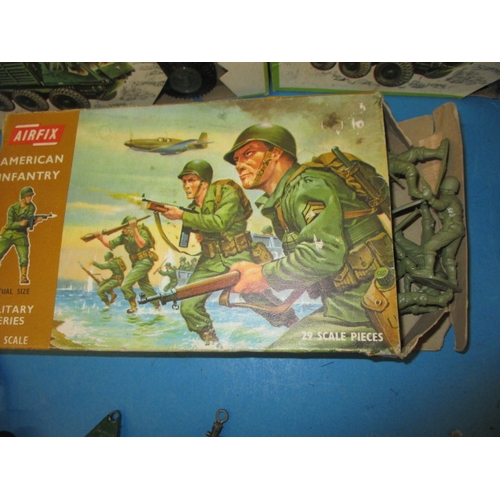 239 - A quantity of vintage Airfix scale models and figures, from the military series, most in original pa... 