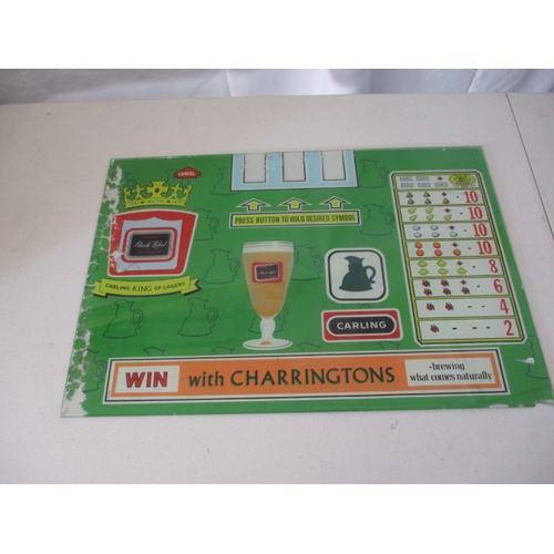 249 - A vintage pub reel type slot machine glass front panel, advertising Carling beer. Small chip to one ... 