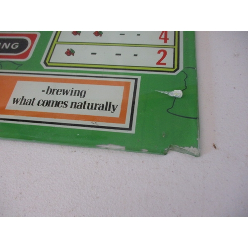 249 - A vintage pub reel type slot machine glass front panel, advertising Carling beer. Small chip to one ... 