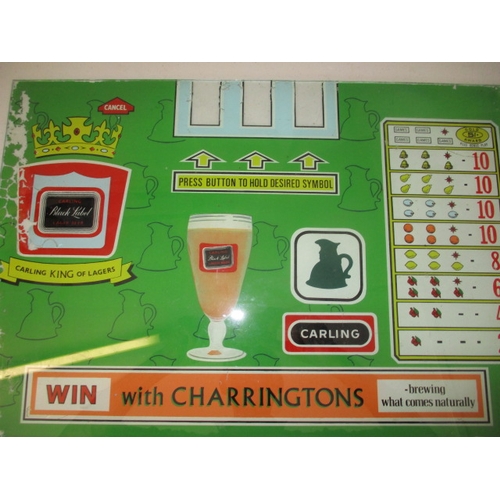 249 - A vintage pub reel type slot machine glass front panel, advertising Carling beer. Small chip to one ... 