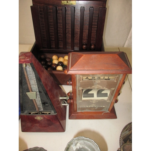 251 - A parcel of interesting collectables, to include an antique treen string post, perpetual calendar an... 