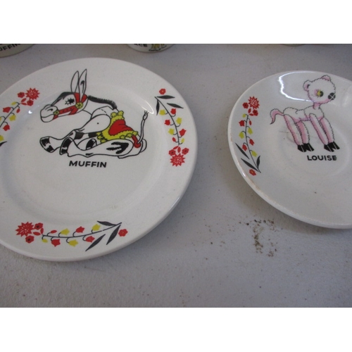 254 - A vintage English made child’s part tea set, depicting characters from ‘Muffin the Mule’. 2 pieces w... 