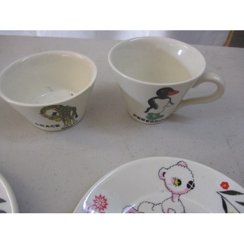 254 - A vintage English made child’s part tea set, depicting characters from ‘Muffin the Mule’. 2 pieces w... 