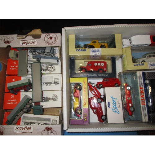 261 - A large quantity of vintage die-cast model vehicles, most boxed and unused