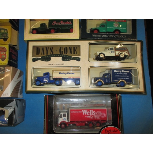 261 - A large quantity of vintage die-cast model vehicles, most boxed and unused