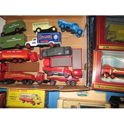 261 - A large quantity of vintage die-cast model vehicles, most boxed and unused