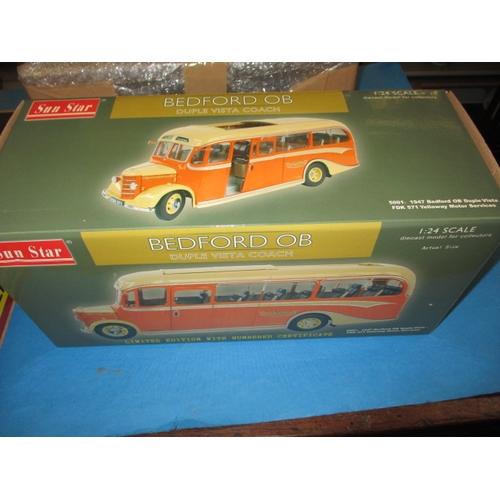 263 - Two large 1/24 scale model busses, boxed and unused and each with a Perspex display case, the Routem... 