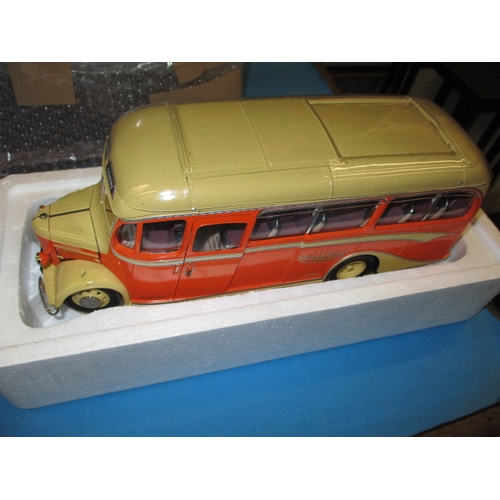 263 - Two large 1/24 scale model busses, boxed and unused and each with a Perspex display case, the Routem... 