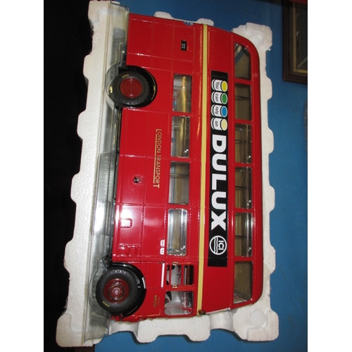 263 - Two large 1/24 scale model busses, boxed and unused and each with a Perspex display case, the Routem... 