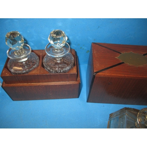 272 - A parcel of small decanters, to include a boxed pair for perfume, the mallet shape has a small chip ... 