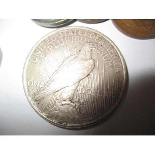 275 - A parcel of vintage coins, to include a 1922 American silver Dollar, all in circulated condition