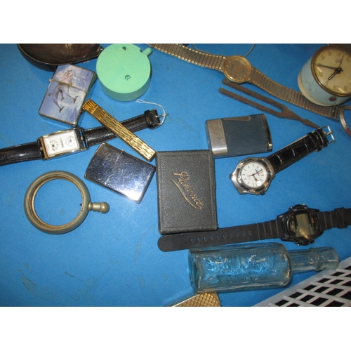 277 - A parcel of miscellanea, to include watches and lighters, all in used condition and not tested as to... 