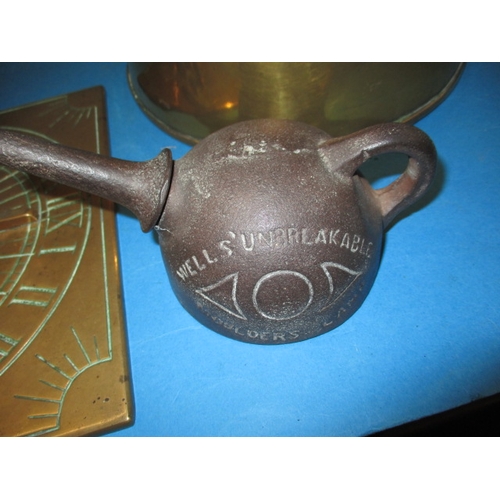 290 - A parcel of metalwares, to include a large copper plant pot and a cast iron A. C. Wells & Co unbreak... 