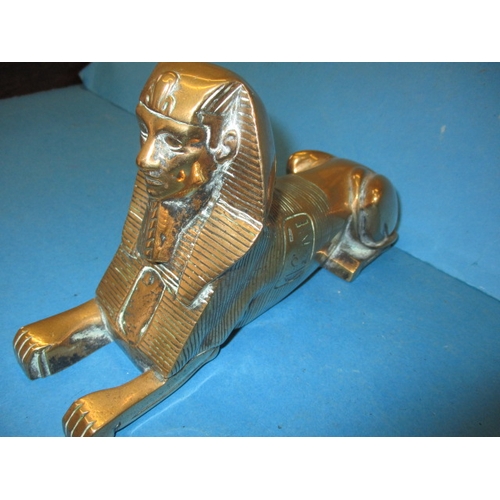 291 - A 1930s cast bronze sphinx door stop, approx. length 24cm in good useable pre-owned condition