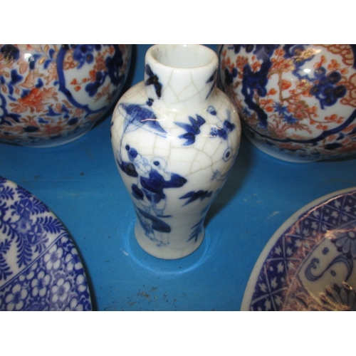 293 - A quantity of vintage oriental ceramics, all in used condition, approx. diameter of plates 31cm