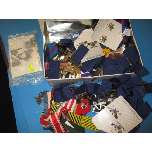 300 - A parcel of replica military badges and insignia, most unused