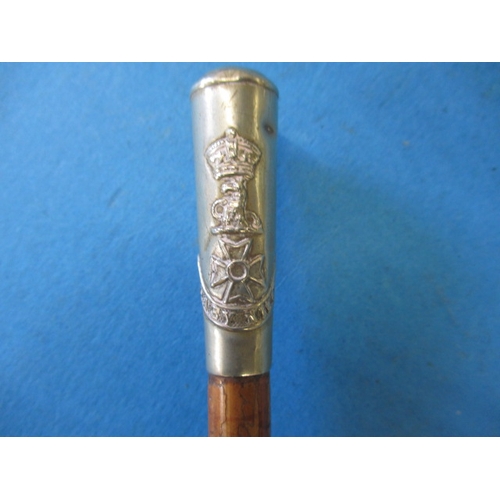 303 - A vintage military swagger stick, the nickel silver cap reads Toaey Nikato, approx. length 66cm in u... 