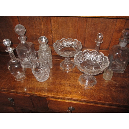 310 - A parcel of glass decanters and other items, one decanter with chip to rim, no other observed damage