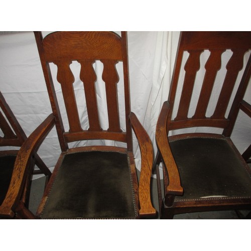 56 - A set of 6 (4+2) arts and craft oak chairs in the manner and probably by Shapland & Petter of Barnst... 