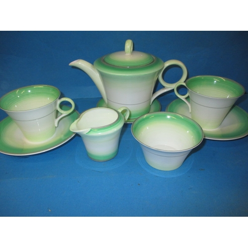 263 - A 1930s Shelly china tea for two set, pre-owned but in unused condition