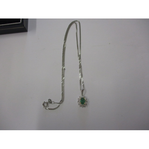 53 - A 9ct white gold necklace with diamond and green gem set pendant, approx. linear length 38cm, approx... 