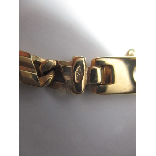 54 - A 9ct yellow gold bracelet, approx. linear length  19.5cm, approx. weight 12g, in useable pre-owned ... 