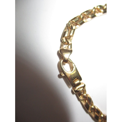 54 - A 9ct yellow gold bracelet, approx. linear length  19.5cm, approx. weight 12g, in useable pre-owned ... 