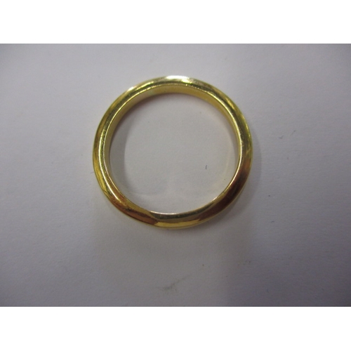 34 - A 22ct yellow gold wedding band, approx. ring size ‘L+’, approx. width 2.6mm, approx. weight 3.9g in... 