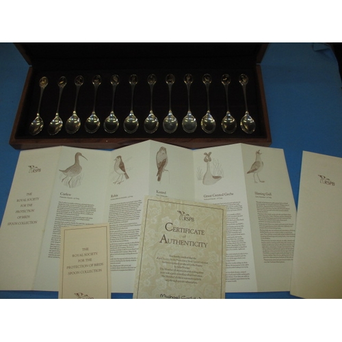 216 - A boxed set of 12 sterling silver spoons for the RSPB produced by John Pinches, originally only avai... 