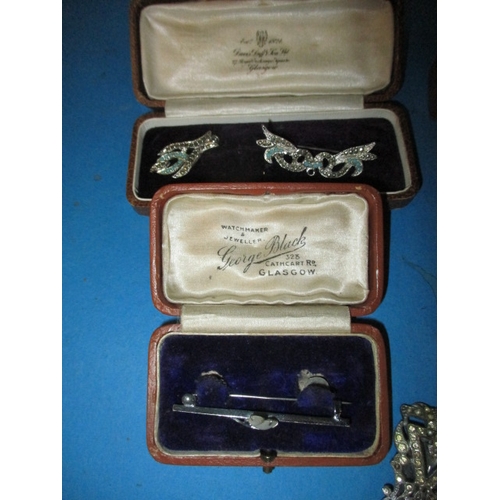 245 - A vintage jewellery box with contents, to include Scottish items and a pair of 9ct gold and turquois... 