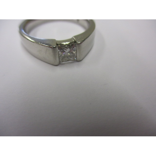 17 - A 950 platinum and diamond solitaire ring, the square princess cut stone measuring approx. 0.5ct, ap... 