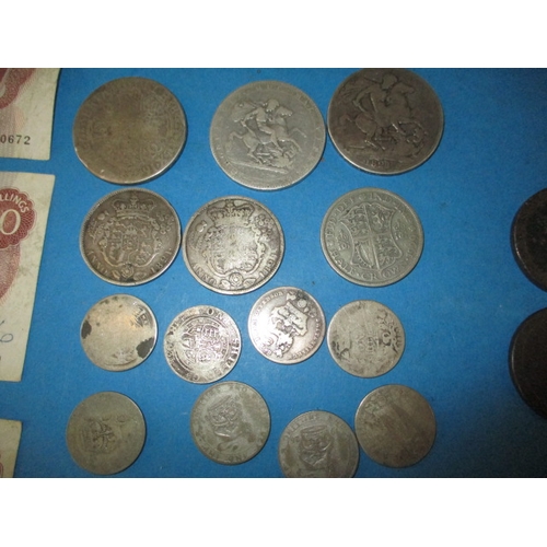 205 - A parcel of Georgian and later coins, to include silver examples and a quantity of 10 shilling notes... 