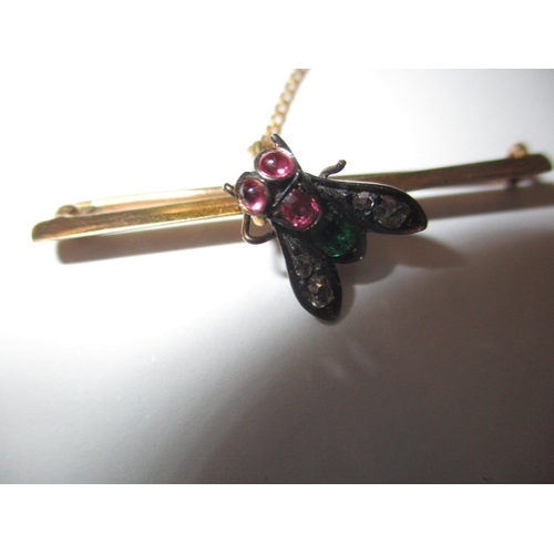 56 - A Victorian yellow gold fly brooch set with diamonds Rubies and an emerald, approx. weight 4.4g, unm... 