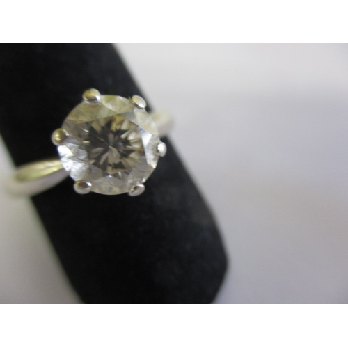 18 - A 750 white gold diamond solitaire ring, approx. ring size ‘R ½ ‘ Approx diameter of stone 7.2mm, ap... 