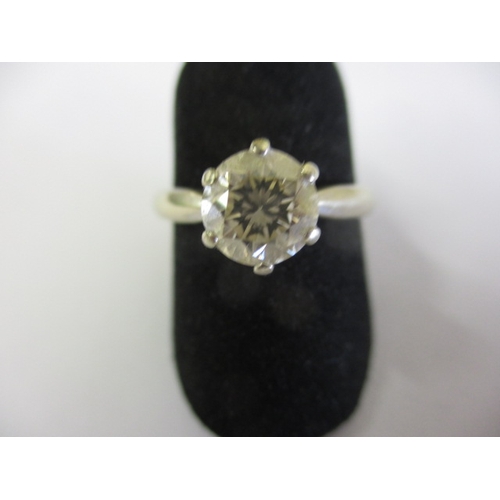 18 - A 750 white gold diamond solitaire ring, approx. ring size ‘R ½ ‘ Approx diameter of stone 7.2mm, ap... 