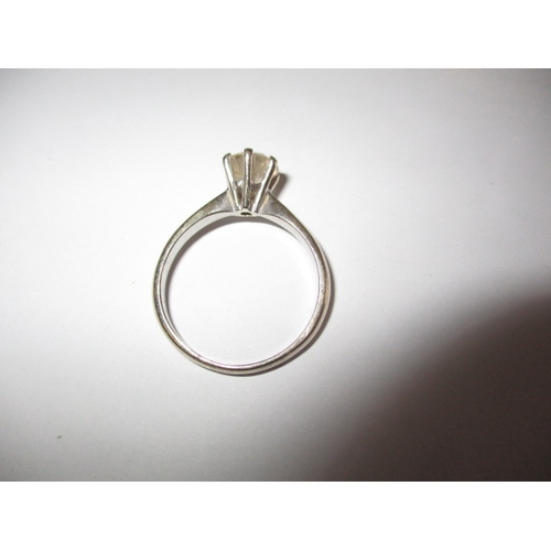 18 - A 750 white gold diamond solitaire ring, approx. ring size ‘R ½ ‘ Approx diameter of stone 7.2mm, ap... 