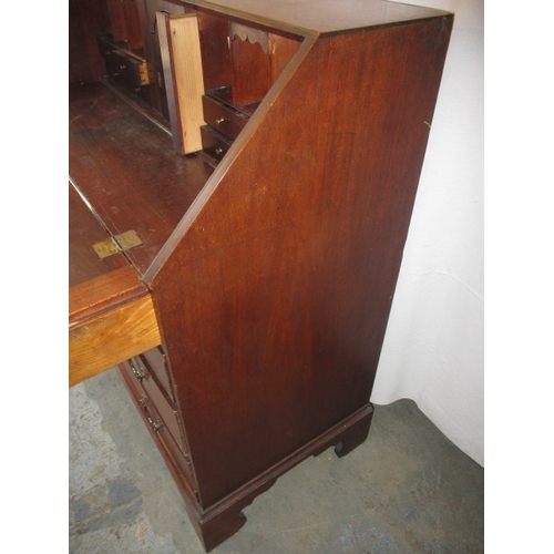 313 - An antique mahogany bureau, with fitted interior over 4 graduated drawers. Approximate dimension: He... 