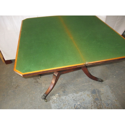 314 - An antique inlaid card table, with green baize playing service. General age related marks, in useabl... 