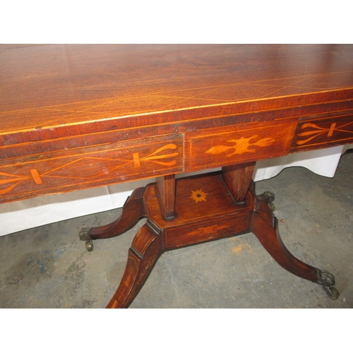 314 - An antique inlaid card table, with green baize playing service. General age related marks, in useabl... 