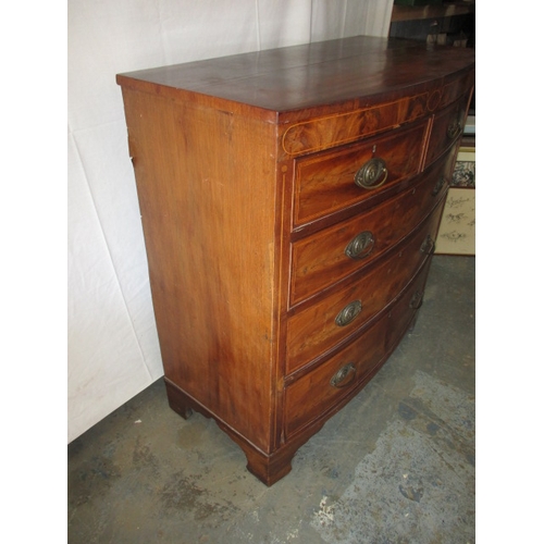 311 - A 19th century mahogany bow fronted chest of 2 short over 3 long graduated drawers. In useable pre-o... 