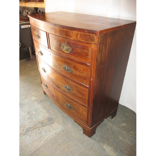 311 - A 19th century mahogany bow fronted chest of 2 short over 3 long graduated drawers. In useable pre-o... 