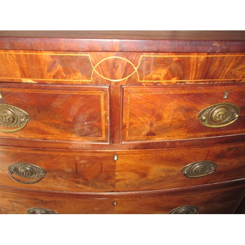 311 - A 19th century mahogany bow fronted chest of 2 short over 3 long graduated drawers. In useable pre-o... 