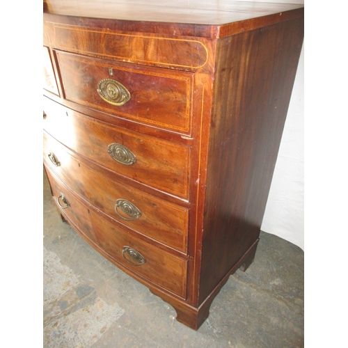 311 - A 19th century mahogany bow fronted chest of 2 short over 3 long graduated drawers. In useable pre-o... 