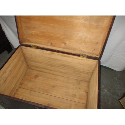 321 - A vintage pine storage trunk, in pre-owned condition with key and working lock. Approximate dimensio... 